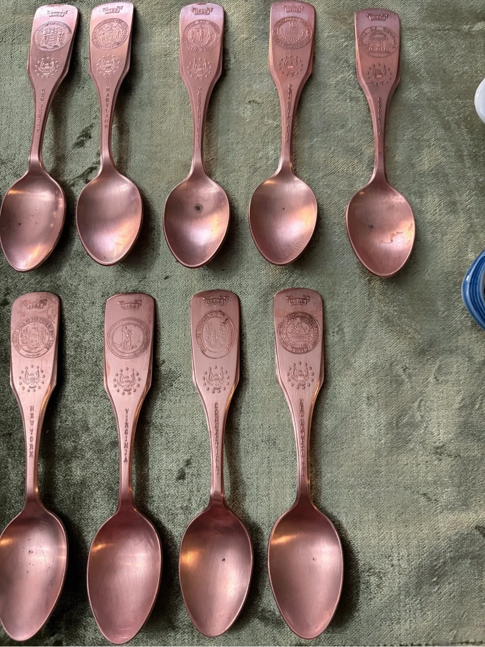 Vintage-13 Spoons United Silver Co.-Copper plated -vintage wall holder
